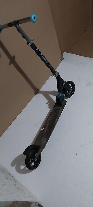 Trotineti, skejtbordovi i hoverbordovi: Trotinet Oxelo (Decathlon) – model sa velikim točkovima - Dva točka — 4