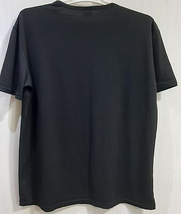 t shirt: Qara qadın T‑şörtü – üzərində “Does this shirt make me look pregnant?” — 2