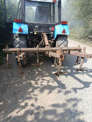 qoşqu lapetlər: Kultivator – traktor arxasına qoşulan torpaq yumşaldan və alaq