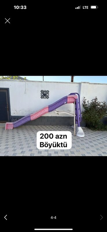 купить коляску анекс бу: Çəhrayı və bənövşəyi rənglərdə olan böyük plastik uşaq sürüşkənidir