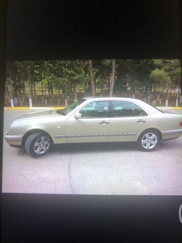 LuAZ: Mercedes-Benz 220: 2.2 l | 1998 il Sedan