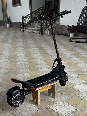 qara canta: Güclü elektrikli skuter – ST-777 Xüsusiyyətlər: - Güclü ikili motor — 2