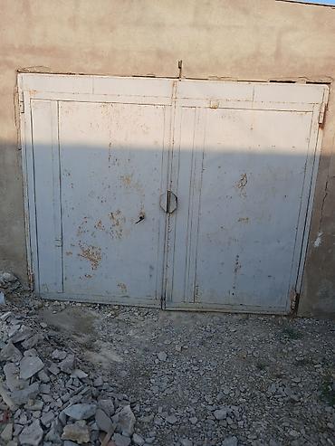 Qaraj darvazaları: Metal ikiqat darvaza qalın ağır darvazadı problemi yoxdu 2.55 eni 2.7 — 2