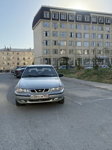 домкрат для машины: Представляем серебристый седан Daewoo Nexia, который отличается
