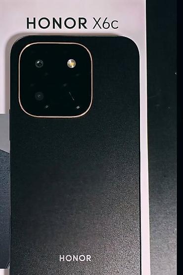 telefon note 10: Honor X6c, цвет - Черный — 1