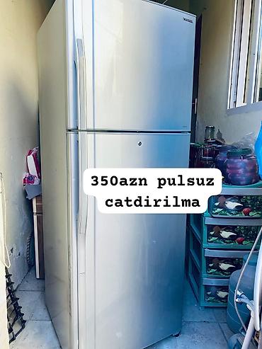 Soyuducu – üstdən donduruculu, iki qapılı model. - Rəng: gümüşü (inox