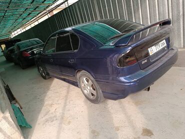 Другой тюнинг: Седан темно-синего цвета с аэродинамическим обвесом и заниженным — 7