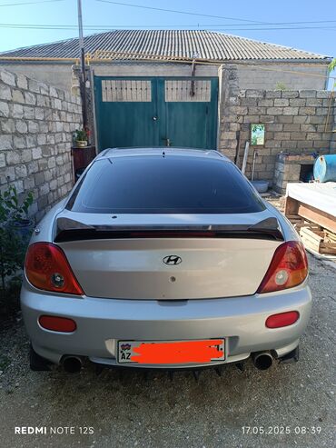 титановые диски дордой: Hyundai Coupe (Tiburon) – gümüş rəngli 2 qapılı sport kupe hazir at lalafo.az титановые диски дордой: Hyundai Coupe (Tiburon) – gümüş rəngli 2 qapılı sport kupe hazir
