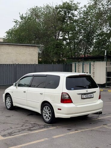 хонда адисей 1: Белый минивэн Honda Odyssey. Подходит для семейных поездок или для