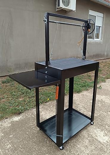 Sve za roštilj: Podesivi roštilj u dimenziji rešetke 65x45 cm Rešetka je izrađena od — 7