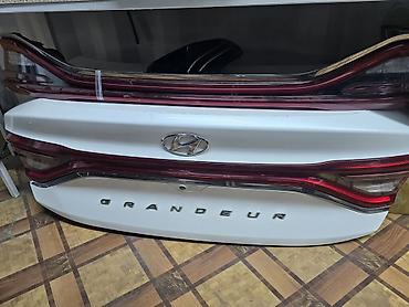 Крышка багажника Hyundai Grandeur (логотип и надпись GR A N D E U R)