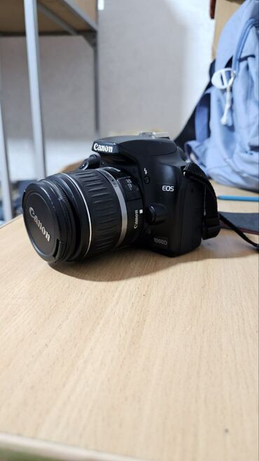 Фотоаппараты: Canon 1000d привазной из России состояния отличное!