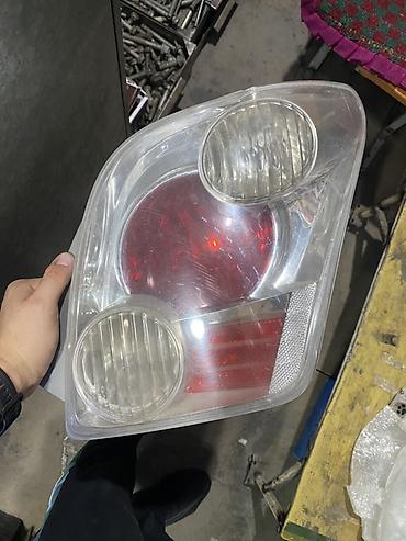 знак дорожный: Задний фонарь (правый) для автомобиля Toyota Ist — 1