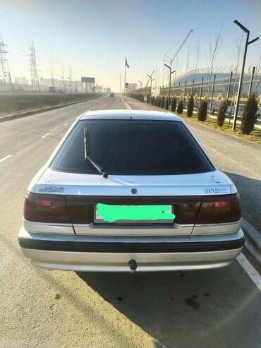 Mazda: Mazda 626: 1989 г., 2 л, Механика, Газ, Хэтчбэк — 5