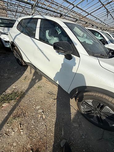 самокаь: Электромобиль Skyworth EV6 (обозначение на корме: 606), белый кузов — 3