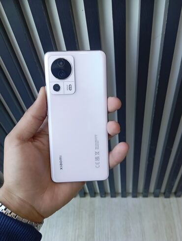 xiam: Xiaomi 13 Lite, 256 GB, rəng - Narıncı, 
 Düyməli, Barmaq izi, İki sim kartlı