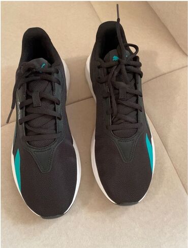 мужская кроссовки: Кроссовки Puma, размер.43-44.выполненные в черном цвете с бирюзовыми