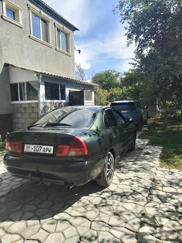 купить кожаные сиденья для авто бу: Mitsubishi Carisma: 1997 г., 1.6 л, Механика, Бензин, Седан