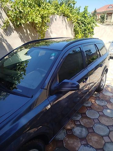 opel astra h sükan: Opel Astra H Caravan (universal kuzov) - Kuzov: 5 qapılı universal — 2