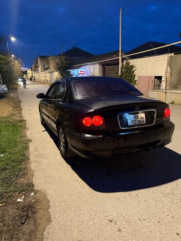 Hyundai: Hyundai Sonata: 2 l | 2004 il Sedan — 12