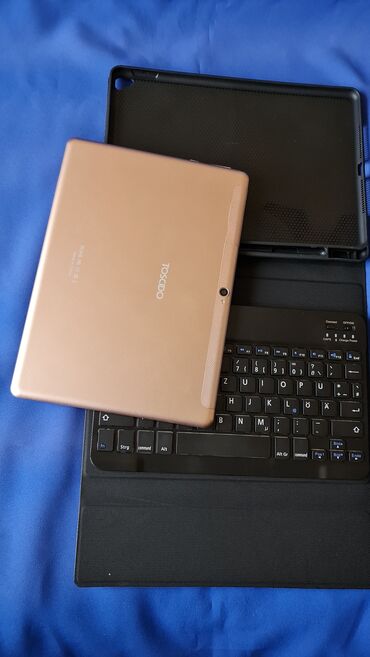 Tableti: Tablet sa maskom,blutut tastaturom, ima za 2 sim kartice, nov — 7