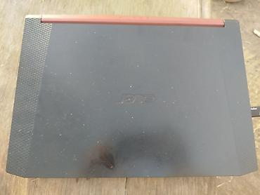 lenovo log: Игровой ноутбук Acer Nitro 5 (серия AN5xx) в черно-красном дизайне — 3