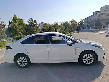 до 250000: Toyota Corolla: 2019 г., 1.8 л, Автомат, Гибрид, Седан — 5