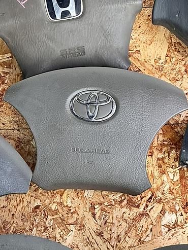 Детали салона: Подушка безопасности SRS для рулевого колеса Toyota. - Оригинальная — 1