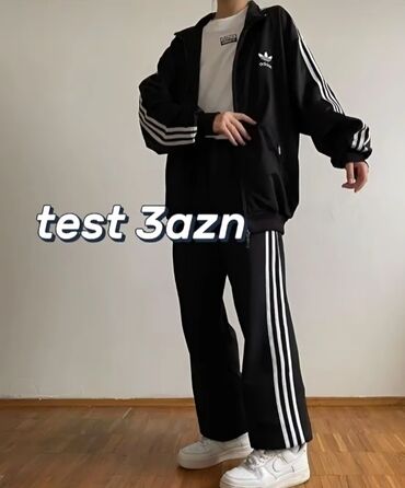 kollec jaketi: Qara rəngdə, zolaqlı Adidas idman dəsti. Dəstə idman üslubunda jaket