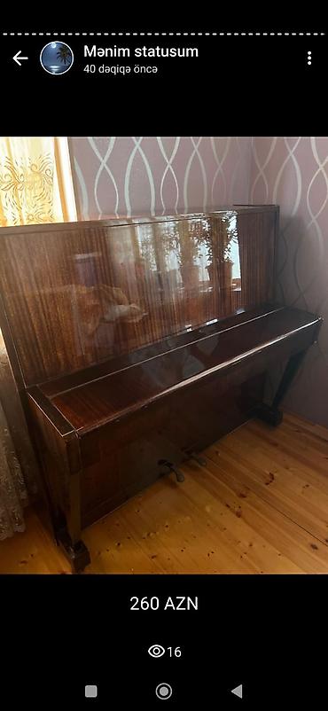 elektron gitara per page 40: Upright pianino – klassik ağac fakturalı, parlaq lak örtüklü gövdə. 2 — 1