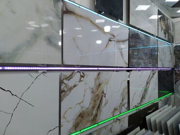 metlax işlənmiş: Mərmər naxışlı keramik plitələr müxtəlif rənglərdə və ölçülərdə