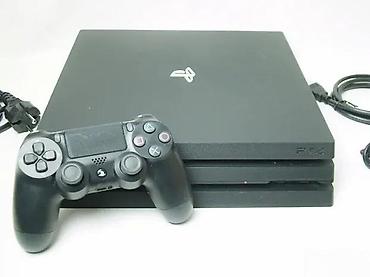 second hand shop electronics: U ponudi je Sony PlayStation 4 sa naslova. Konzola je novija FAT — 5