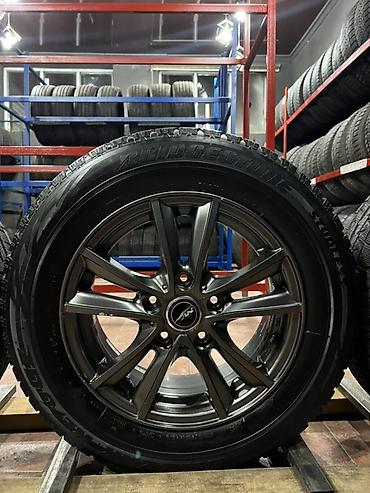 Транспорт: Комплект колес в сборе на литых дисках. - Шины: Bridgestone Studless — 4