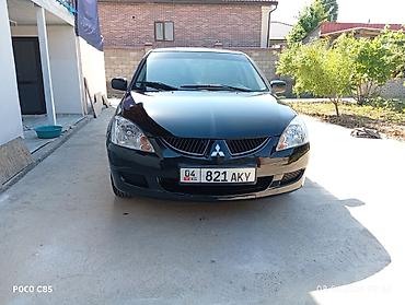 surron light bee: Mitsubishi Lancer: 2004 г., 1.6 л, Механика, Бензин, Универсал — 1