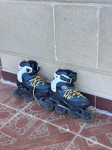3 tekerli velosiped type 1: OXELO TEAL BLUE Kids' Inline Fitness Skates Fit 5 - Racing Ramer 36-39 — 1