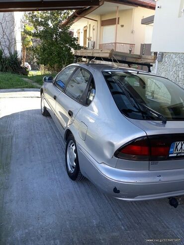 Toyota: Toyota Corolla: 1.3 l. | 1992 έ. Sedan — 5