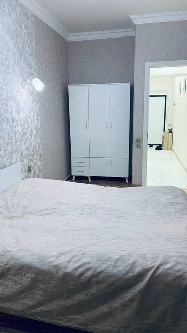 Uzunmüddətli kirayə mənzillər: Bayilda asan xidmətə yaxin 18 mertebeli binanın 5-ci mərtəbəsində — 5