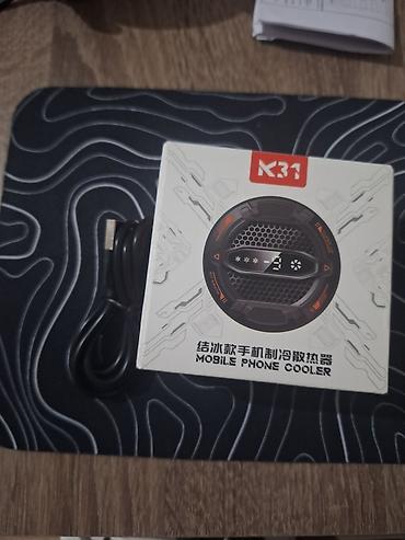 mac utu feni: Mobil Telefon Soyuducusu – K31 - Universal klipsli konstruksiya — 1