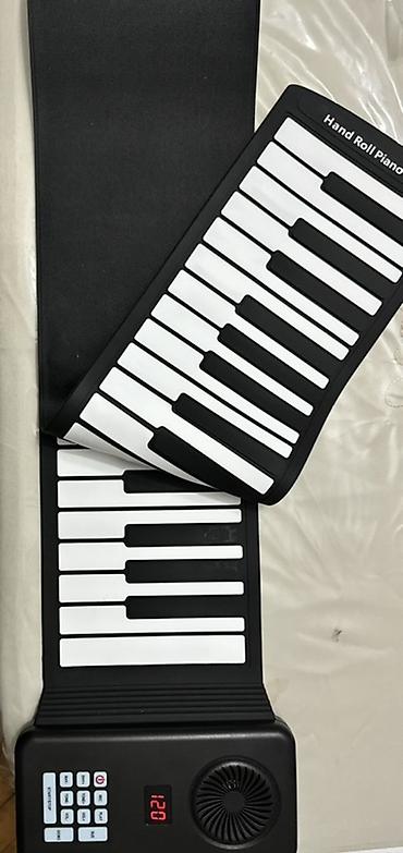 mini piyano: 88 klavişli, Portativ roll-up piano (qatlanan elektron klavişli musiqi — 1