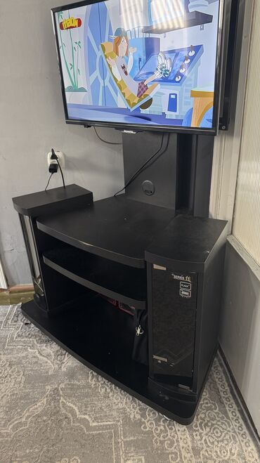 подставки под телевизор стеклянные: Телевизордун шкаф жана стенди, Колдонулган, Полго орнотулма, МДФ, Өзү алып кетүү, түсү - Кара