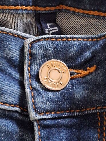 Farmerke: Ženske farmerice od tamno-plavog teksasa sa ravnim krojem i srednjim na lalafo.rs — 6 Farmerke: Ženske farmerice od tamno-plavog teksasa sa ravnim krojem i srednjim — 6