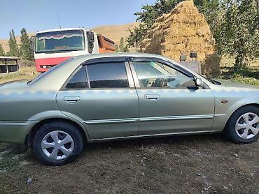 мата секыл: Mazda 323: 2000 г., 1.6 л, Автомат, Бензин, Седан — 4