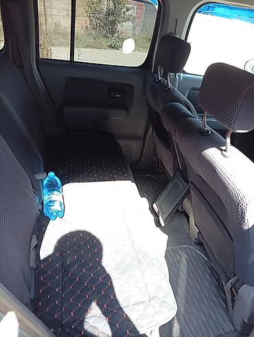 авто в такси: Nissan Cube: 2003 г., 1.3 л, Автомат, Бензин, Минивэн — 4