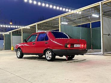 автомобиль фольксваген поло: Model: Tofaş Şahin (sedan) Rəng: Qırmızı Kuzov: 4 qapı, sedan Yanacaq — 1