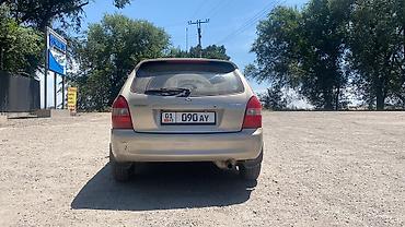 рекистон пикап: Mazda 323: 2001 г., 1.6 л, Автомат, Бензин, Универсал — 2