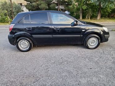 фольксваген поло хэтчбек: Kia Rio: 1.4 l | 2006 il Hetçbek