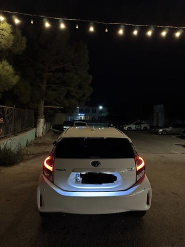 Toyota Aqua hibrid İli 2019 140 000 probeq Taksi buraxlışı var 2031-ə at lalafo.az — 2 Toyota Aqua hibrid İli 2019 140 000 probeq Taksi buraxlışı var 2031-ə — 2