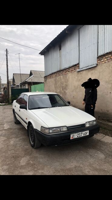 мини пылесос для автомобиля: Mazda 626: 1989 г., 2 л, Механика, Бензин, Седан