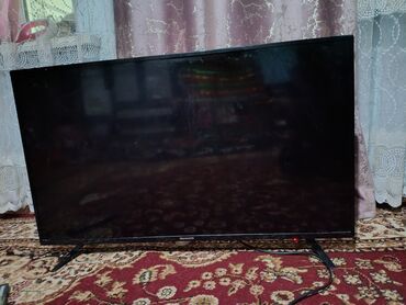ноутбук бу бишкек: Телевизор Skyworth, диагональ примерно 32–40". - Плоская LED‑панель