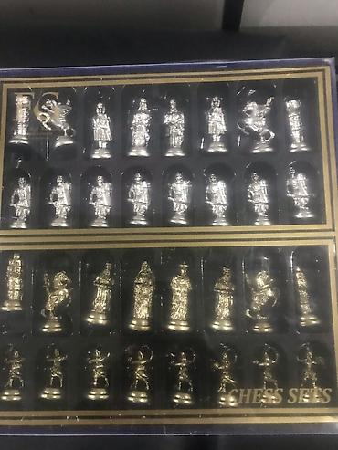 Şahmatlar: Şahmat dəsti, qızılı və gümüşü rəngli parçaları olan, qara rəngli -da lalafo.az — 4 Şahmatlar: Şahmat dəsti, qızılı və gümüşü rəngli parçaları olan, qara rəngli — 4